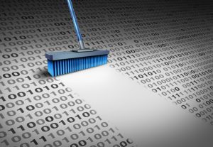Deleting data technology concept as a broom wiping clean binary code as a cyber security symbol for erasing computer information or to delete an email and clean a hard drive server with 3D illustration elements.